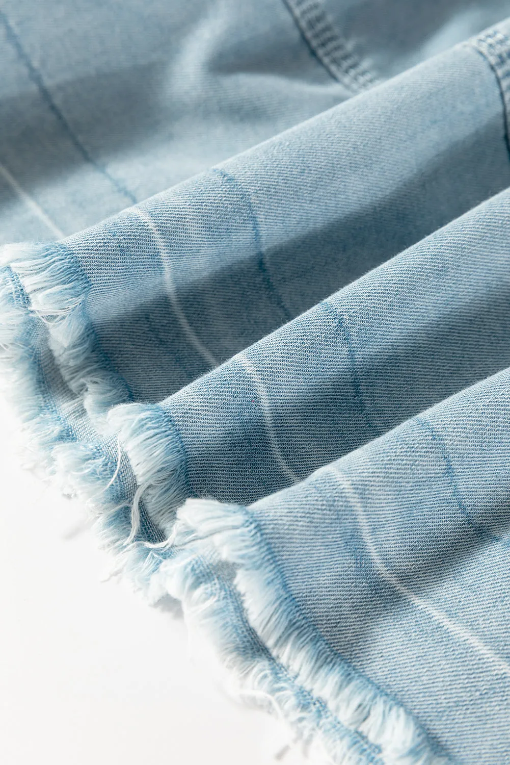 Beau Blue Light Wash Exposed Stitching Raw Hem V Neck Denim Top