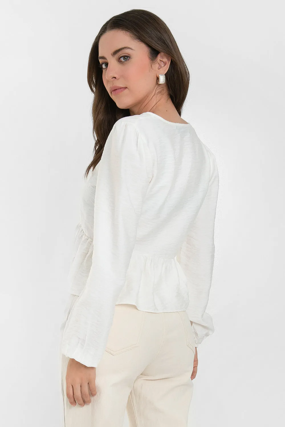 Blusa manga larga escote lazos