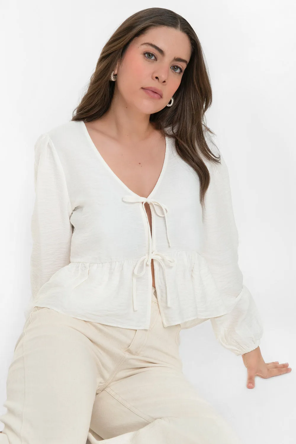 Blusa manga larga escote lazos