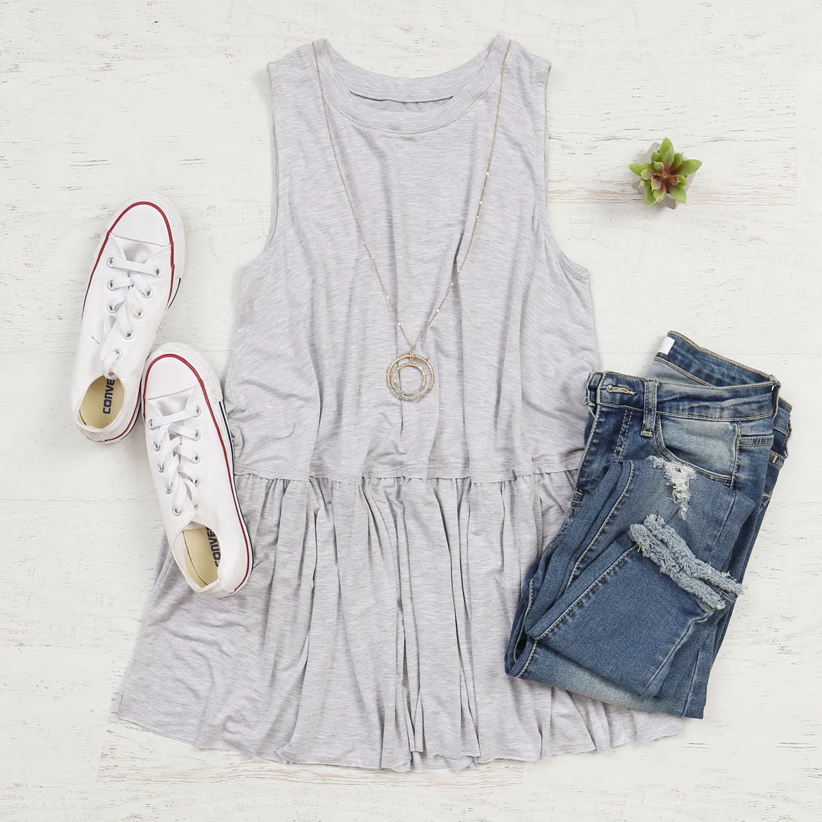 Sleeveless Peplum Tunic